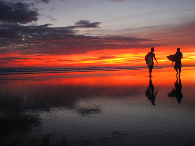 Two surfers enjoy (and contribute to) Nicaraguan surf culture at sunset in Popoyo. Photo: Zach Weisberg