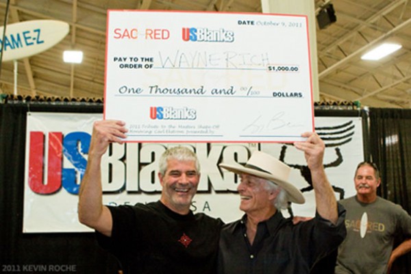 Wayne Rich looking happy with an over-sized cheque. Photo: Roche