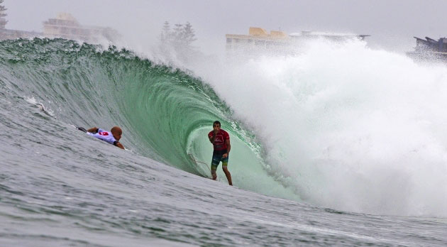 Parko flips Slater the bird. Priority's a b***h, and this is the perfect image to kick off 2013. Photo: ASP/Carey