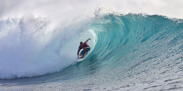 Kelly Slater drives his way through a real barrel. Nothing artificial about this one. Photo: ASP/Kirstin