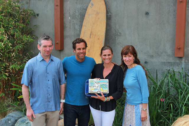 Jack Johnson with his wife and the team from Planet Box.