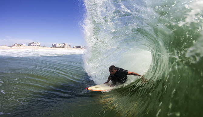 Christian Porter, He said to me right before he paddled out that he would be stoked if I got a good shot of him riding his single fin. This was his second wave.