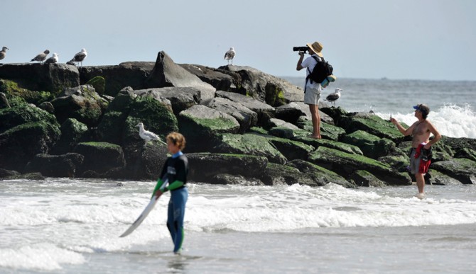 Don't be like this photographer. Be aware of your surroundings and keep your head pointed in the right direction.Photo: Bobby Siliato