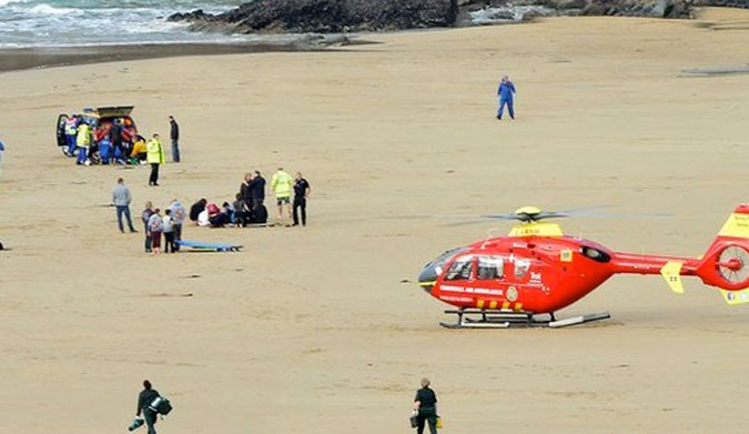 A rescue team responds to the several "999" calls on Sunday morning. The 3 victims were air-evaced to a nearby hospital, but later pronounced dead. Photo: Cornish Guardian 