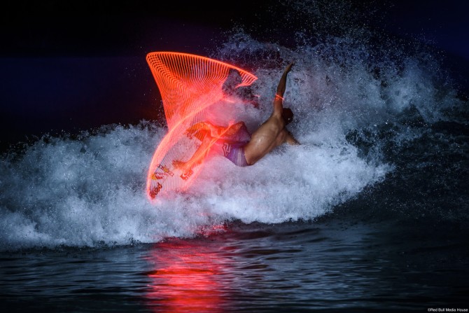 Adriano de Souza performing Red Bull's 'Surfing Lights' project at Wadi Adventure. Photo: Red Bull