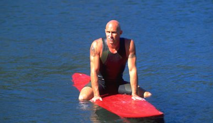 Who would've guessed that Mickey, the arrogant bald guy (played by Sam George) in 1998's In God's Hands would've predicted the future of big wave surfing? Photo: Tristar Pictures