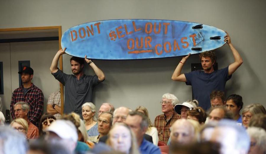 Alex Lowe, left, and Rob Moddlemog traveled all the way to Morro Bay from Orange County to support ousted California Coastal Commissioner Charles Lester, who was fired Wednesday amid a sea of controversy. (Photo:  Al Seib / Los Angeles Times)