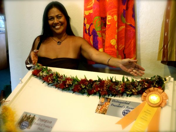 Polynesian by blood, Madeline Guyett presents her award-winning lei at the Kauai Museum.