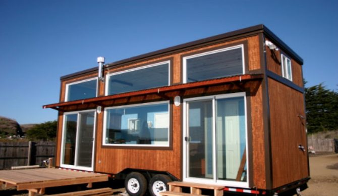 Surf checks are no problem from inside this surfer's portable tiny home. 