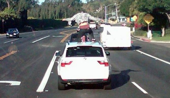 A Malibu teen car surfs in Los Angeles. Photo: LA County Sheriff's Department via AP