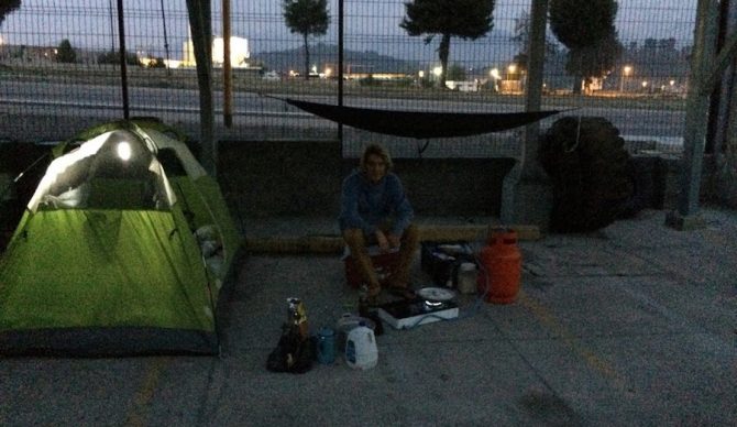 When the car breaks down, you're forced to camp where you can. Mechanic's parking lot in Xela, Guatemala. Photo: Wyatt Fowler