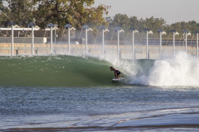 Filipe Toledo is not mad about being inside of a KS Wave Co barrel. Look how much he loves it! Photo: WSL/Kenneth Morris