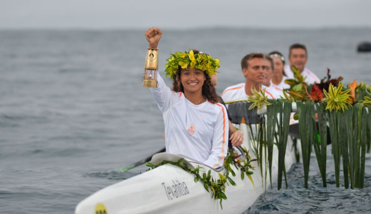 Surfer Vahine Fierro Carries Olympic Torch During Tour Of French Polynesia