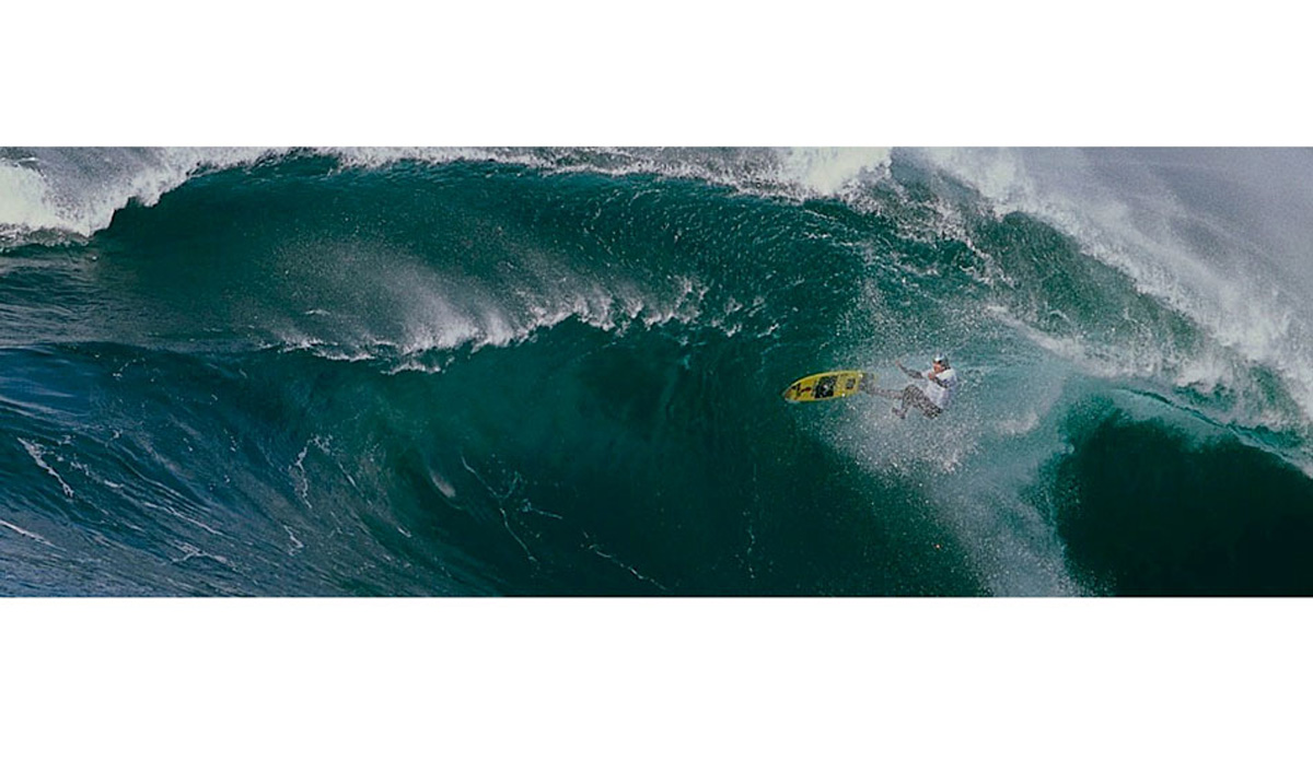 Garrett McNamara, Shark Park 2006.  Even at Mach 4, GMac gets overtaken by the doubleup and takes a beating.  This wave won the \'Best Wipeout of The Year\' award from both Billabong XXL  and SURFER Mag. Photo: <a href=\"http://www.greghuglin.com\">Greg Huglin.</a>