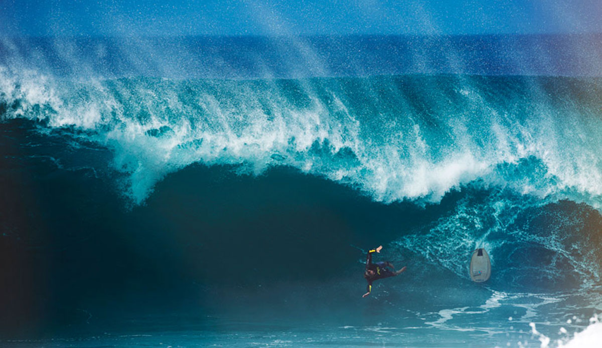 Outrageous. Nathan Fletcher about to take a hell of a ride. Pipeline, December 2011. Photo: <a href=\"http://www.dylangordon.com/\" target=_blank>Dylan Gordon</a>