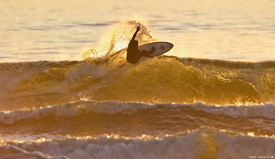 The waves were fun, not as big as the surf at west and northwest exposed breaks, but with lots of zippy, shifting peaks scattered over a large area with lots of waves to ride for the hungry crowd. Shane Steelman snags a beauty in the evening light. Photo: Chuck Schmid/<a href=\"http://surf-shot.com/\" target=\"_blank\">Surf-Shot.com</a>