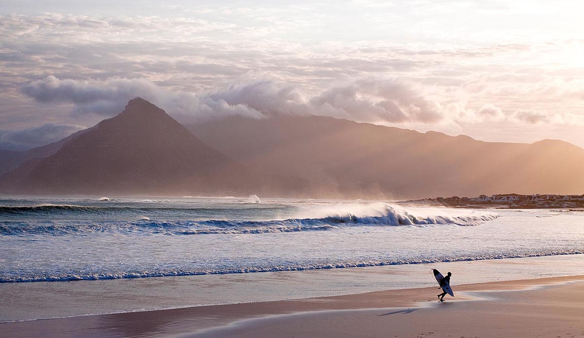 The mountains, clouds, wind. and beaches of Cape Town are rugged and tough. It takes a strong willed surfer to brave the dawnie. Brendon Gibbens exits at sunrise after catching the worm, so to speak.   Photo: <a href=\"https://instagram.com/alanvangysen\">Alan Van Gysen</a>