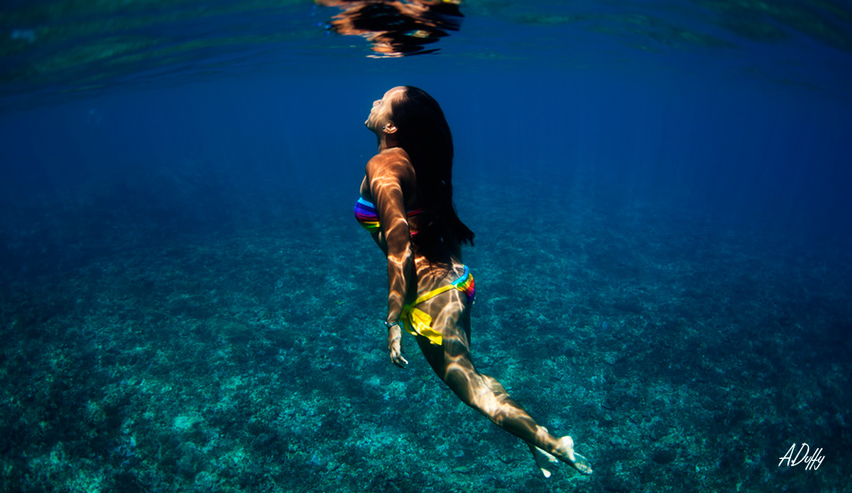 A local girl (vahine) swimming out. Teahupoo, Tahiti. Photo: <a href=\"http://adamduffyphotography.com/\">Adam Duffy.</a>