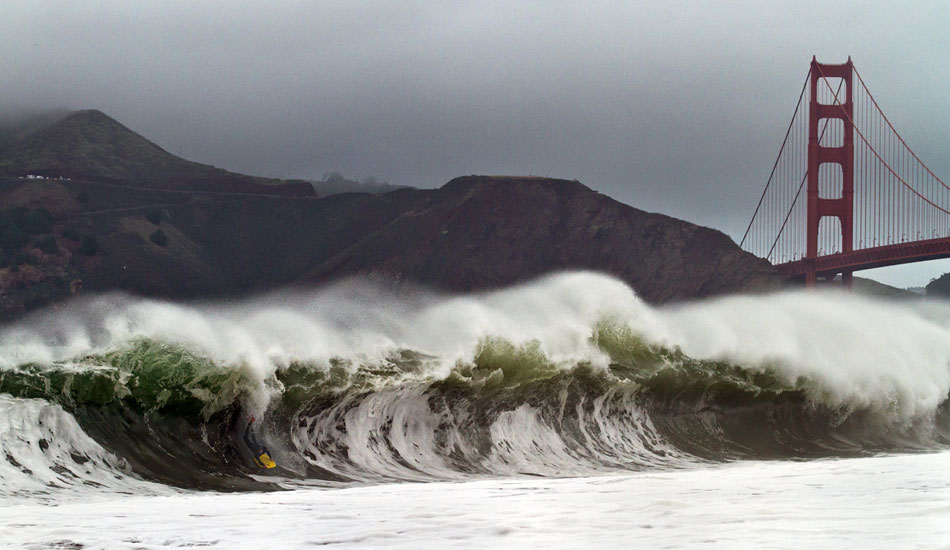 The bridge probably weighs less than the wave. Photo: <a href=\"http://www.adamwarmington.com/\">Adam Warmington.</a>