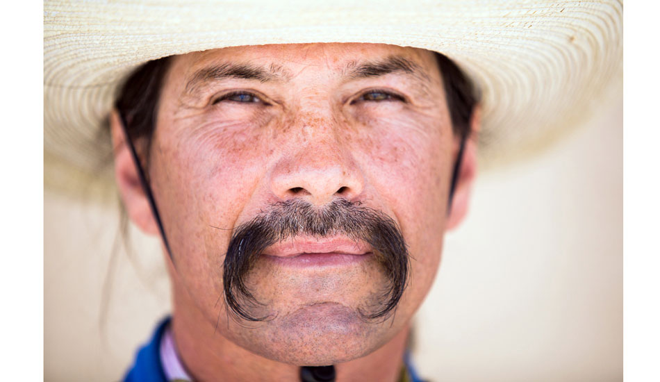 His mouth is getting barreled by that mustache. Photo: <a href=\"http://www.adamwarmington.com/\">Adam Warmington.</a>