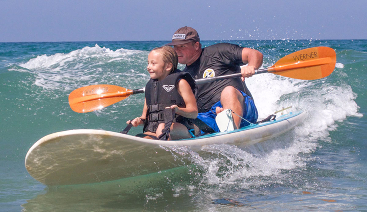 Happiest tandem surf in history. Photo: <a href=\"http://www.isasurf.org/\">ISA</a>