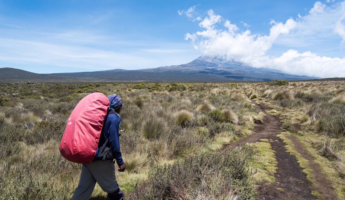 Crossing the Shira Plateau heading to Shira camp. Photo: <a href=\"http://charlesaudet.com/\">Charles Audet</a>