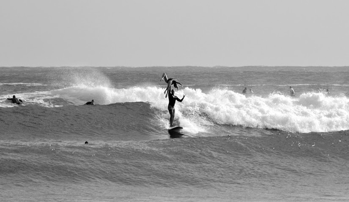 Two tandem surfers refine their skills before the iconic Noosa Surf Festival. Photo: <a href=\"http://instagram.com/alexbenaud\">Alex Benaud