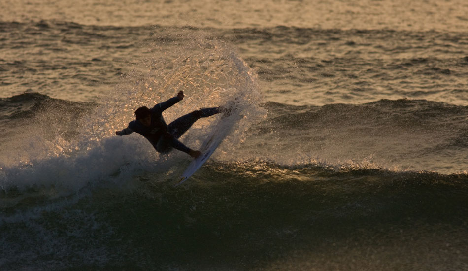 Josh Hughes cutting loose in the last light of the day, Fistral. 