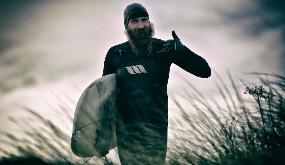 Tommy has caught more waves on the North Coast this winter than anyone else, and he hasn\'t had time to shave. The beard keeps him warmer in the North Atlantic. Photo: <a href=\"www.andyhillphotography.com\">Andy Hill</a>