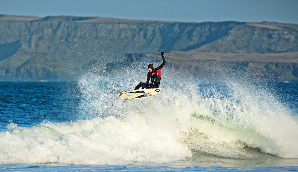 Andrew flying at the Giant\'s Causeway. Photo: <a href=\"www.andyhillphotography.com\">Andy Hill</a>