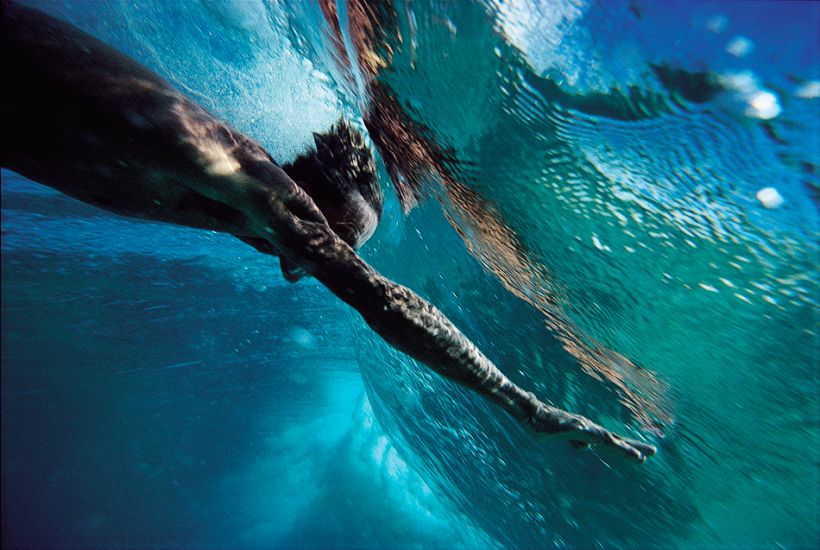 1991. Mark Cunningham on an underwater takeoff at Ehukai Beach. Photo: <a href=\"http://www.artbrewer.com\" target=_blank>Art Brewer</a>