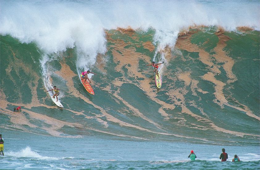 1988. Dennis Pang, Marvin Foster and Mark Foo at Waimea Bay. Photo: <a href=\"http://www.artbrewer.com\" target=_blank>Art Brewer</a>