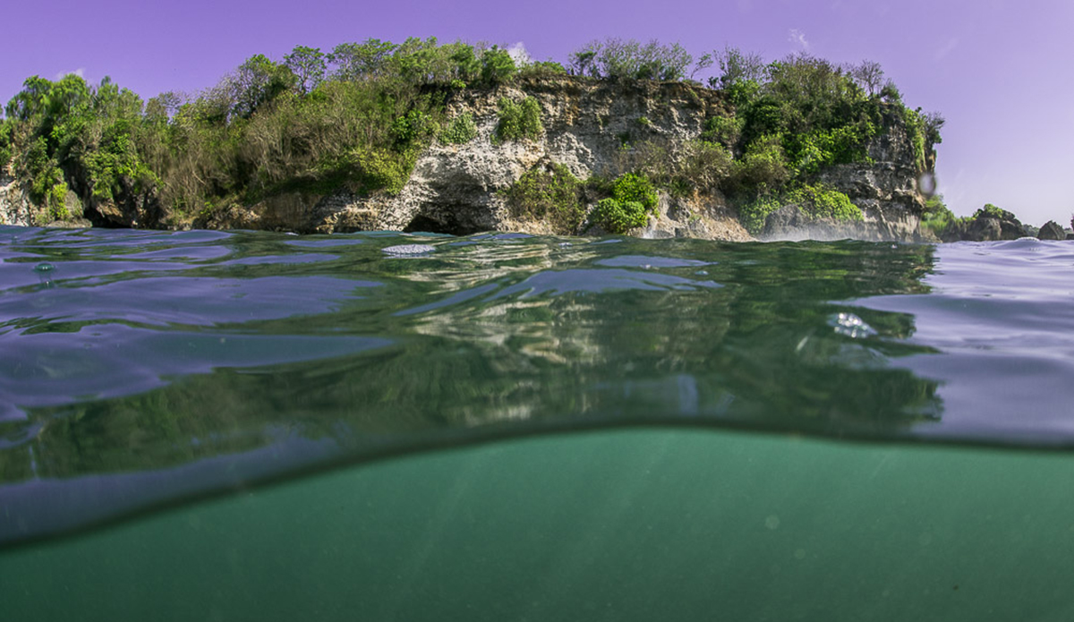 Bobbing around in the channel has its perks.  In between sets I find myself staring at the cliffs in the distance and the reef below. Photo: Austin Robertson