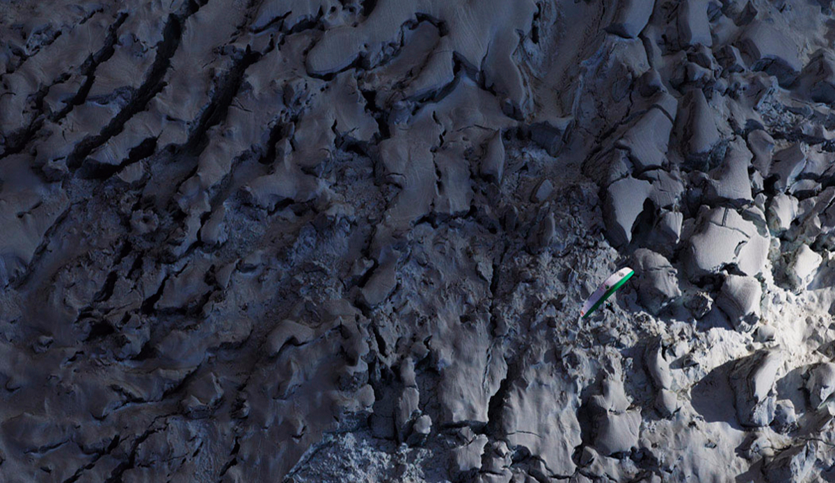 Belgium pilot Tom De Dorlodot soars above the glacier on Rakaposhi in Hunza in northern Pakistan. Photo: <a href=\"https://instagram.com/krystlejwright/\">Krystle Wright</a>