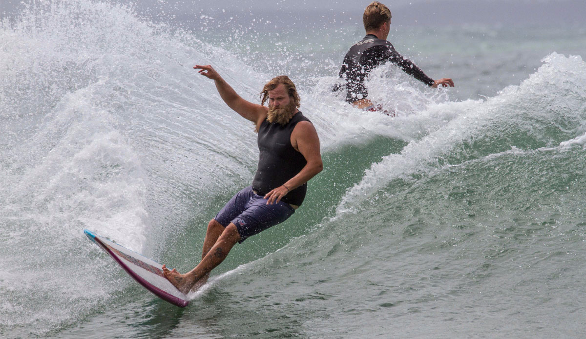 Thomas \"Doc\" Bexon of Thomas Surfboards brings it round with style. Photo: <a href=\"http://www.narrowpathmedia.com.au/#1\"> Andrew Carruthers</a>