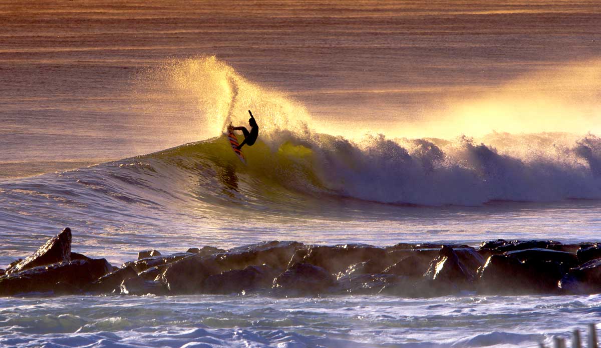 Tom Petriken on an -8 degree day of surfing as if it\'s warm out. 20 lbs of rubber on so can\'t wait to see what he can do when he sheds the weight for this spring and summer. This was my first big gallery feature on SurferMag.com and was truly honored and humbled for the experience. Photo: <a href=\"http://bencurriephoto.zenfolio.com/\">Ben Currie</a>