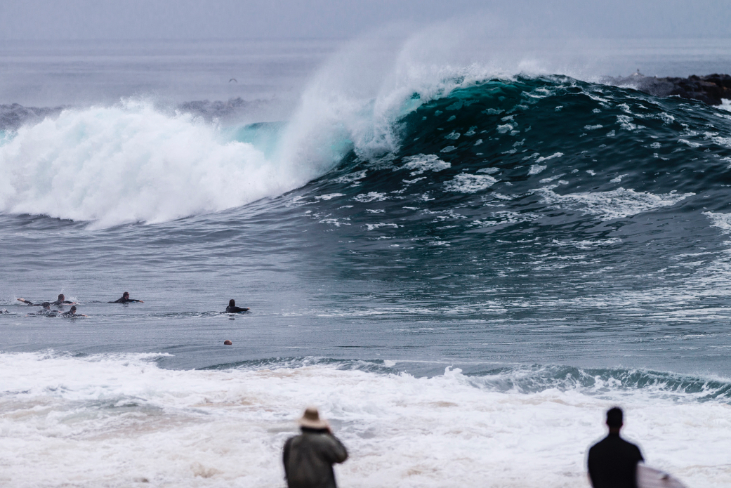 Surfers and bodyboarders ride large, heavy waves at the Wedge in Newport Beach, CA. Photo: Ben Ginsberg