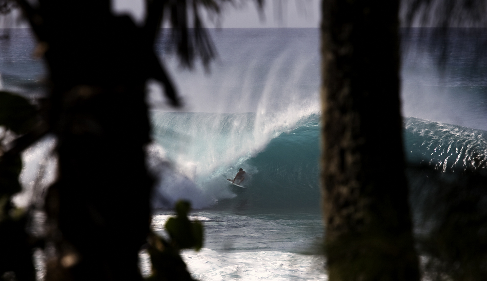 This is another shot from Pipe. I tried to find some different ways to photograph what everybody was seeing from the sand, just not to fall into the \"sameness\". Bruce Irons in the Backdoor Shootout contest. Image: <a href=\"http://www.luizblanco.com/Home.html\" target=\"_blank\">Blanco</a>