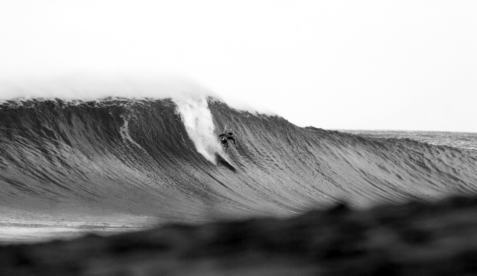 Another black and white shot, now from Hawaii. I think it\'s Aamion Goodwin. The wave is Pipeline for sure! Image: <a href=\"http://www.luizblanco.com/Home.html\" target=\"_blank\">Blanco</a>