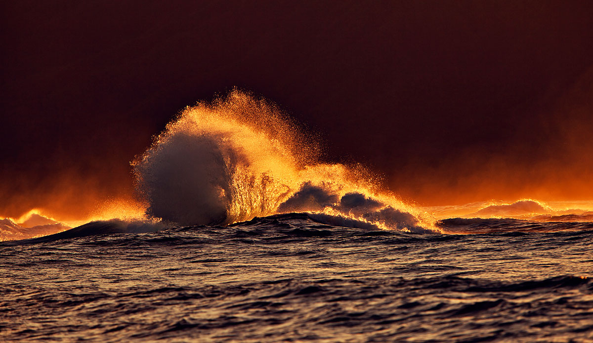 The backwash was more difficult to shoot than I expected.  It broke all over the place and would shoot up in the sky for only a split second.  Cameras get frustrated with auto focus in direct sunlight.  Luckily there was plenty of Fiji Bitter onboard to take away the sting and take us to that happy place again and again!  Photo: <a href=\"http://www.bobridges.com/\">Bo Bridges</a>