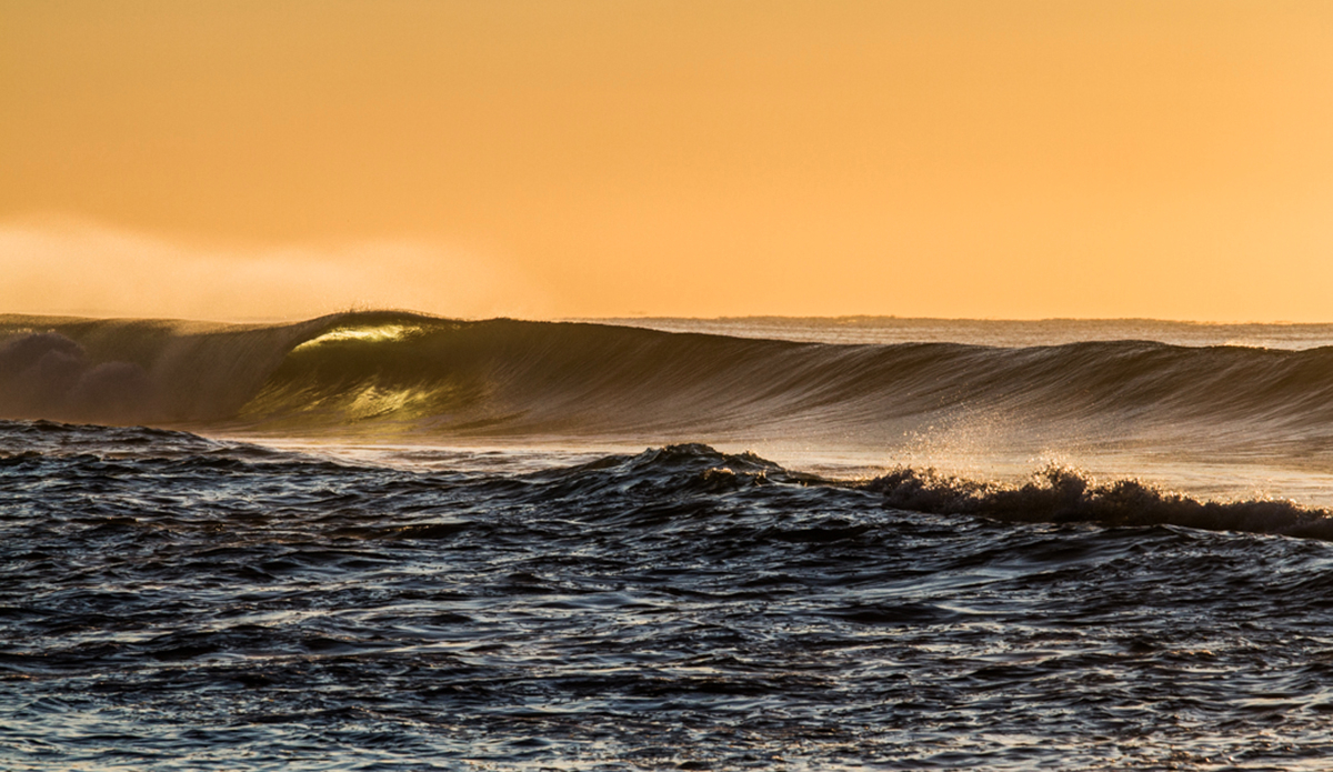 Morning barrels tinted in the harsh morning sun. Photo: <a href=\"http://brentonderooy.com/\">Brenton de Rooy</a>