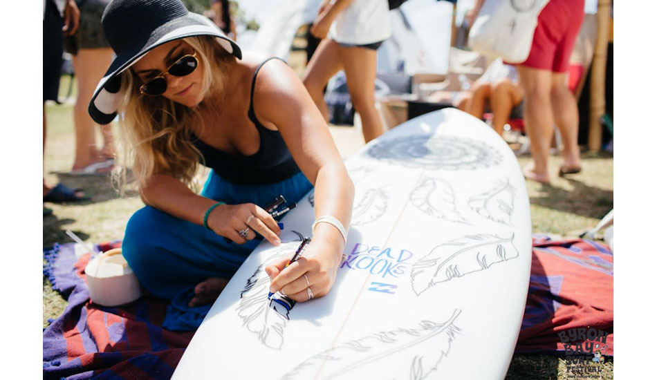 Billabong team rider, Felicity Palmateer, getting creative on a Dead Kooks board for chartity. Photo: <a href=\"http://www.byronbaysurffestival.com/\">Ming Nomchong</a>