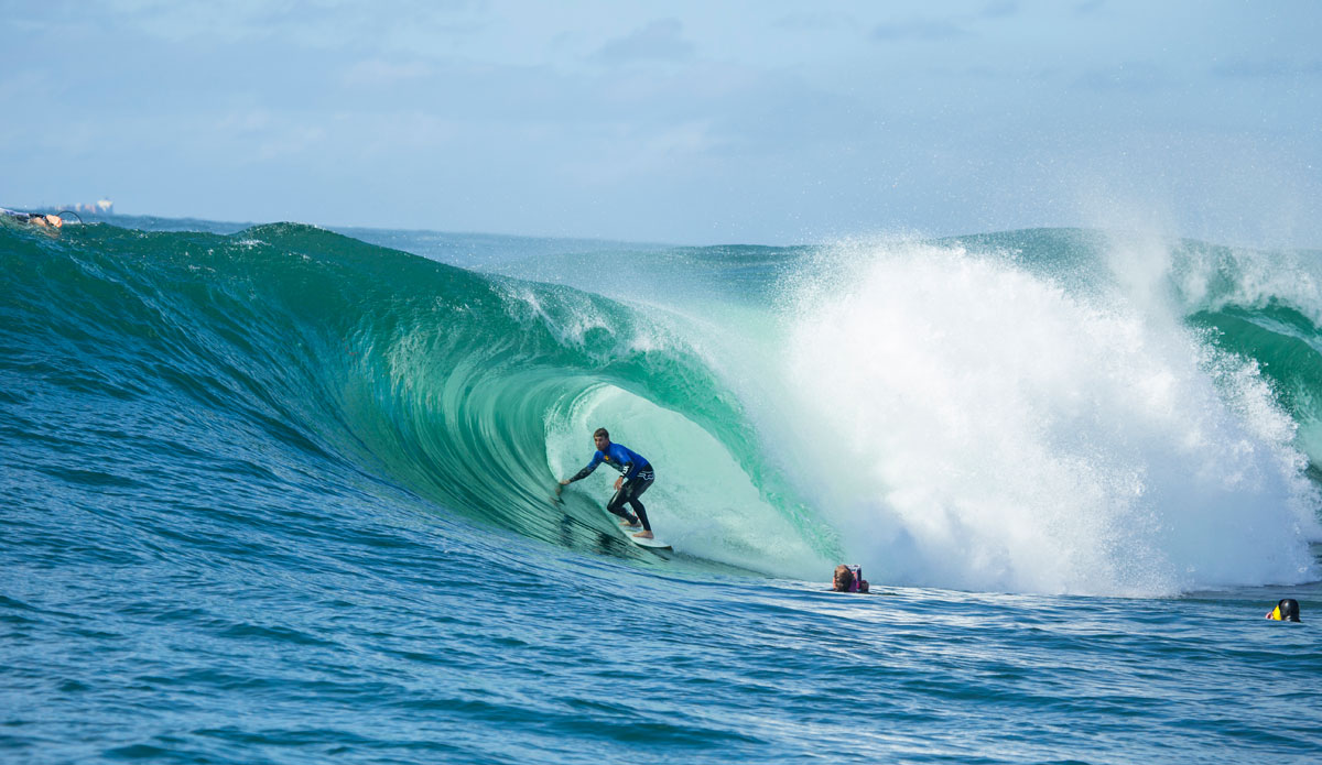 Ian Walsh under the lip. Photo: <a href=\"http://www.redbullcapefear.com/\"> Red Bull</a>