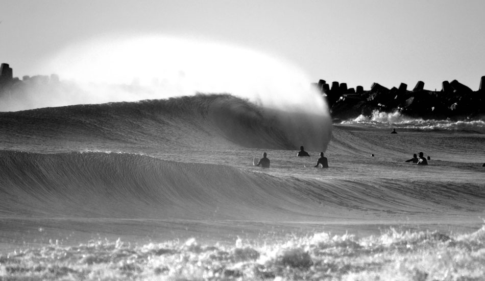 Fear and adrenaline is what drives the locals to take on some of these waves. Unfortunately that\'s not what happened here as a perfect one barrels through. Untouched. Photo: Chris Centrella