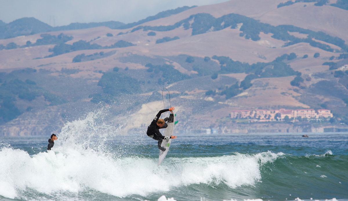 Many angles were shot in this moment. Chippa putting on a show, while Chris Burkard gets the shot from behind. Photo: <a href=\"http://www.colinnearman.com\">Colin Nearman</a>