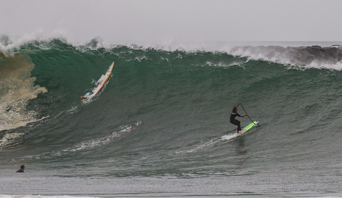 Big board, big paddle, big wave. Photo: Corinne Conklin