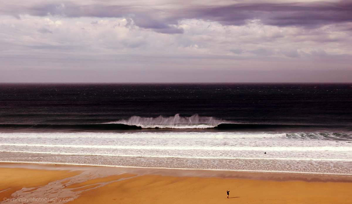 Last winter saw some epic swells and epic storms. Sometimes the wind was too strong to catch the waves, hence these perfect peelers rolled in unridden. Photo: <a href=\"https://plus.google.com/102308141752801627777/posts\"> Simon Rickwood</a>