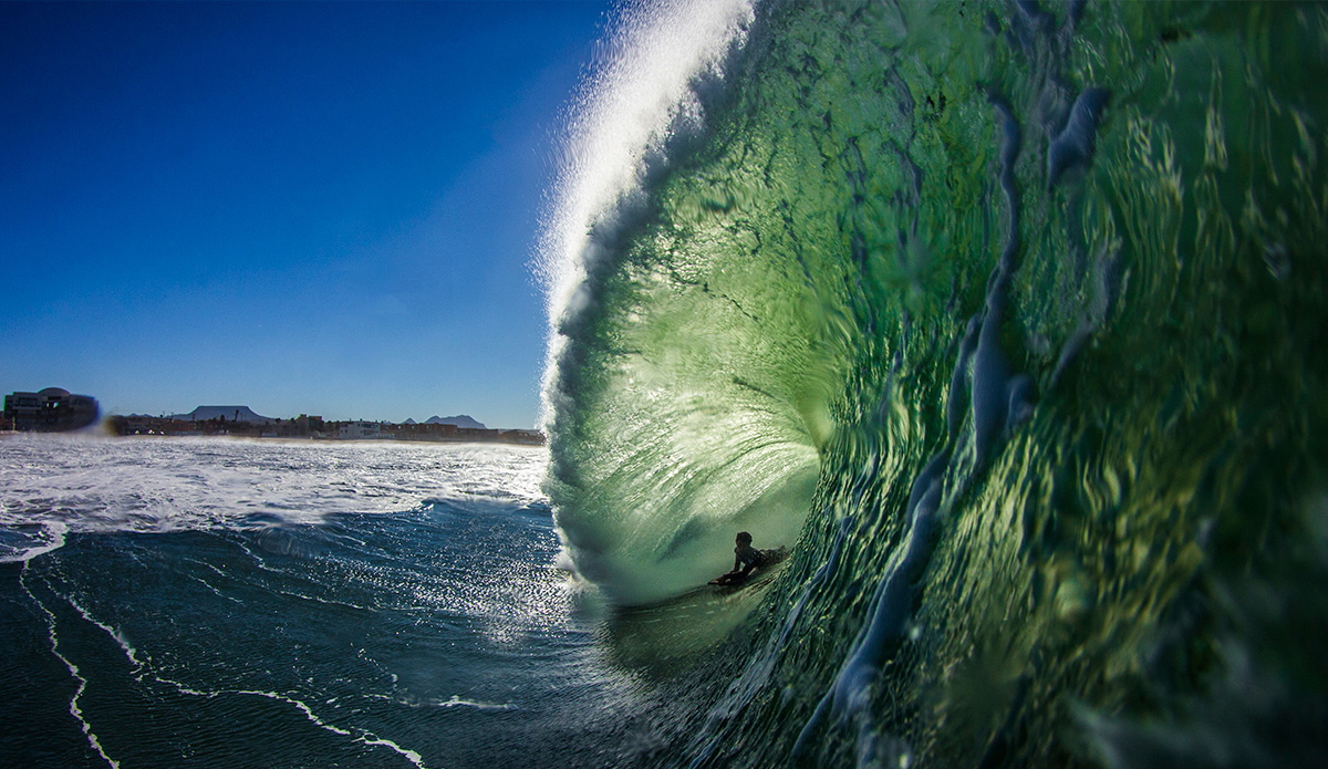 This is my awesome friend, Henry scoring a nice one just out in front of our houses.  We know this spot like the palm of our hand, so if anything good is coming in, we are there scoring! He is a charger! Photo By: Damian Davila