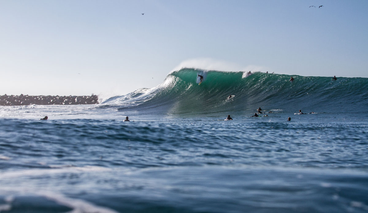 Unknown dropping into a Wedge peak. Photo: <a href=\"http://instagram.com/danny_nieves\"> Danny Nieves</a>