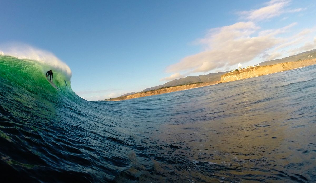 Mavericks, Half Moon Bay, California. 
Patrick Shaughnessy drops into a bomb in October of 2014. A rare sunny and glassy day in Northern California. Photo: <a href=\"https://instagram.com/derekdunfee\">@DerekDunfee</a>